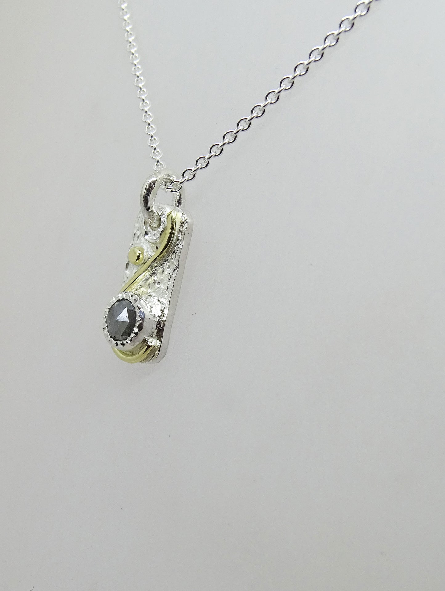 Grey diamond tag