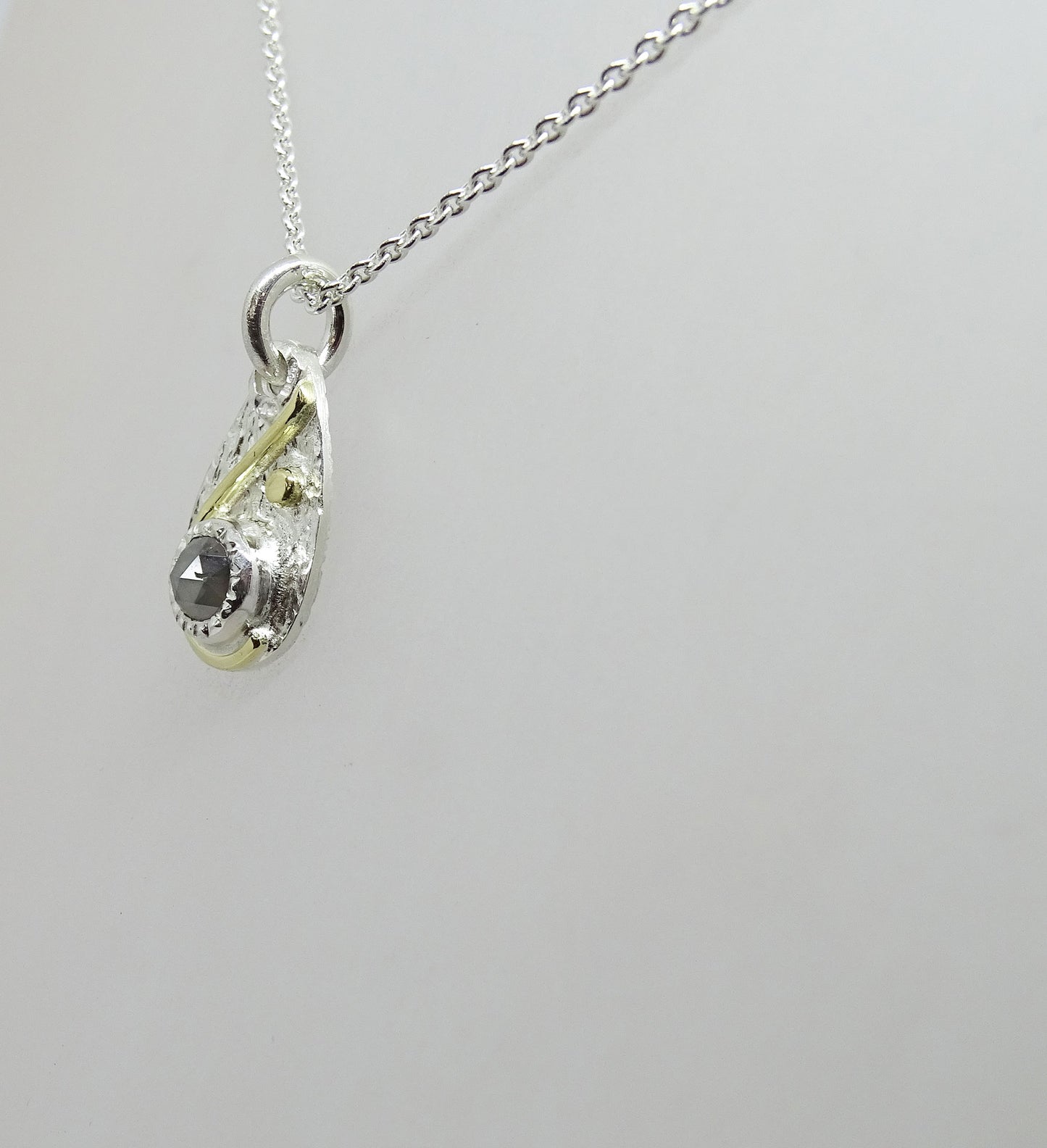 Grey diamond drop
