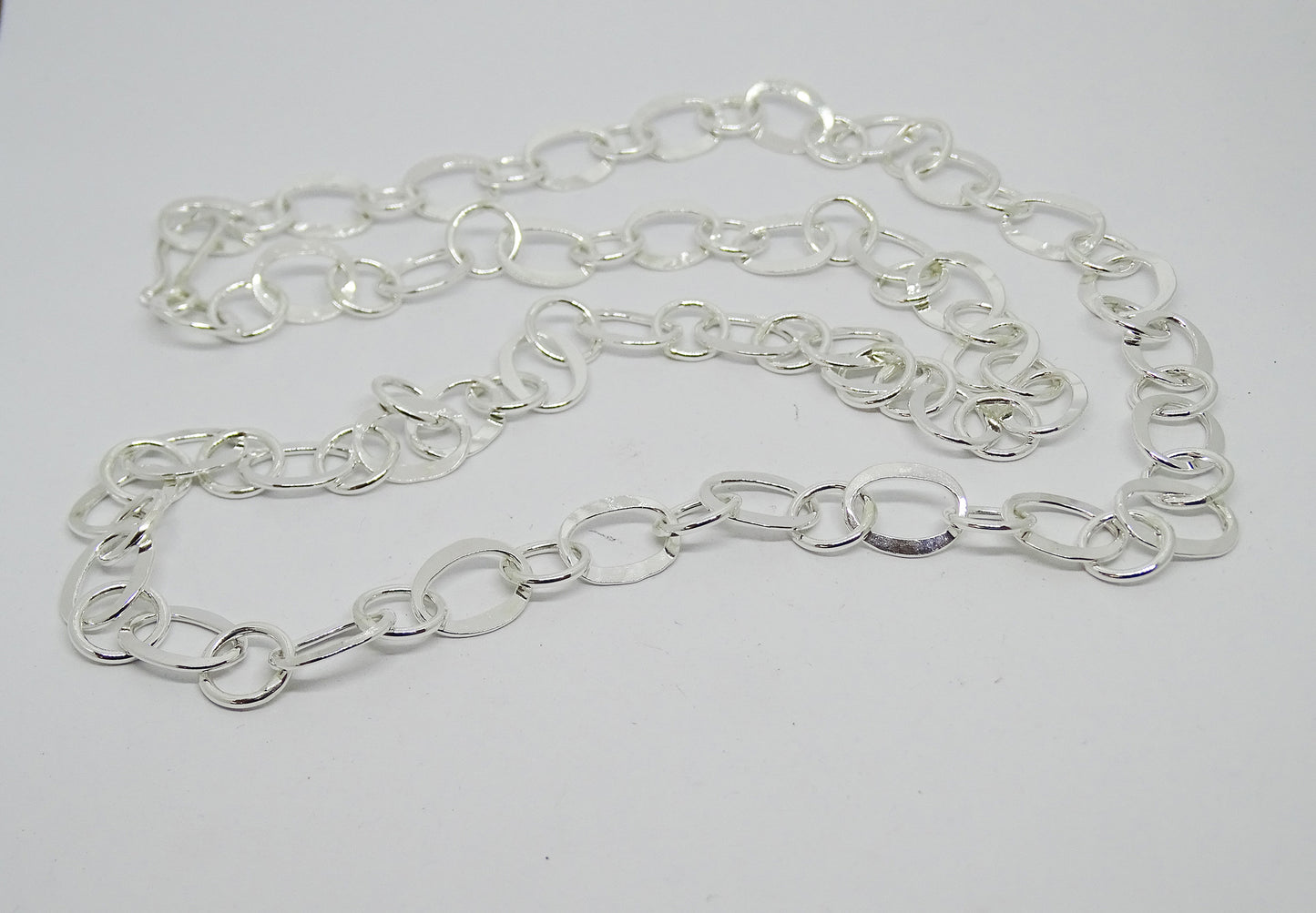 Long hammered chain.
