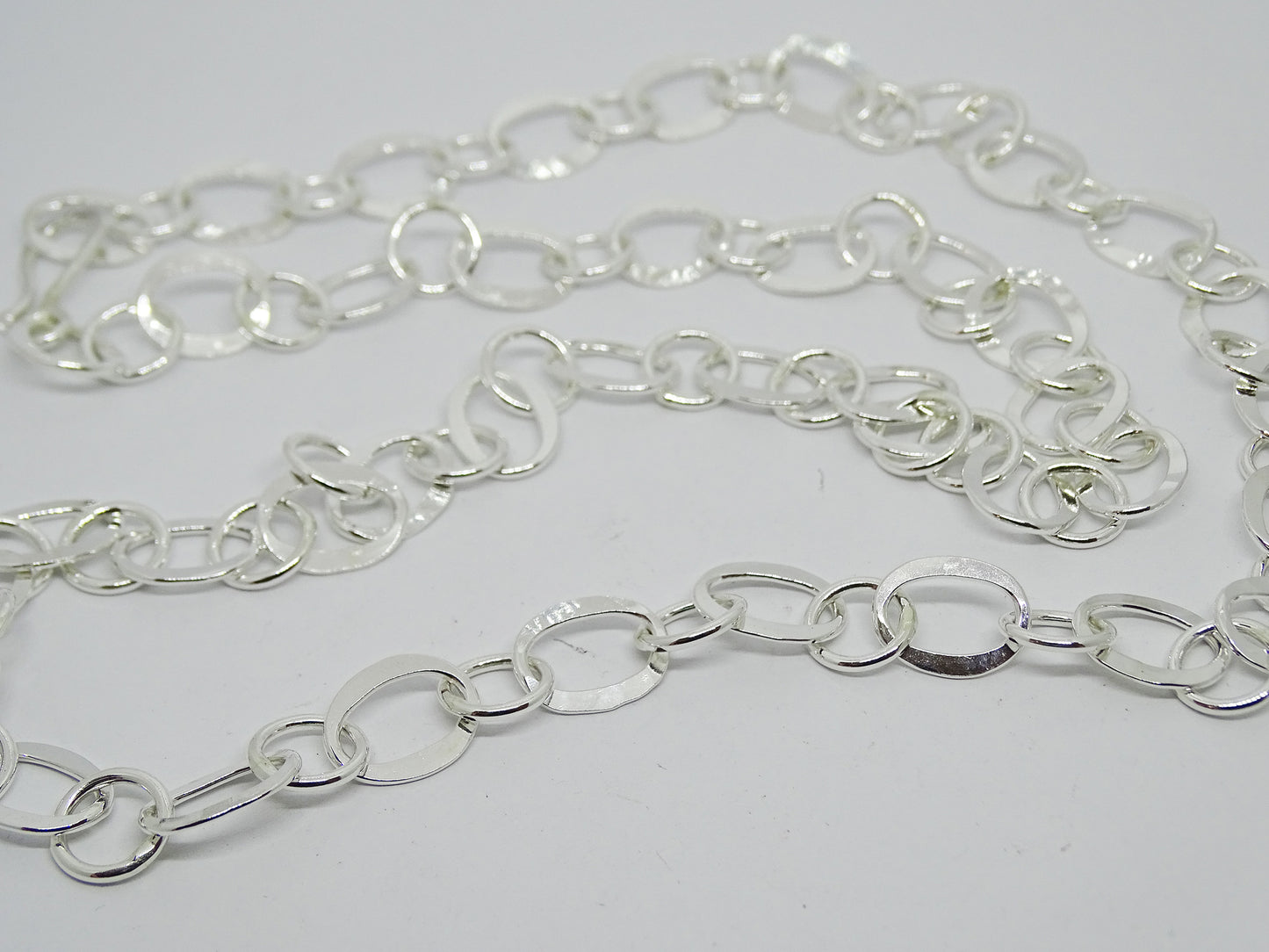 Long hammered chain.
