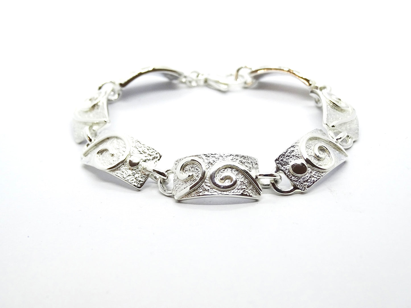 Silver link bracelet.