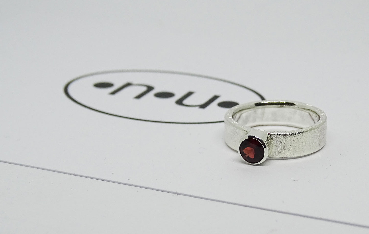 Garnet ring.