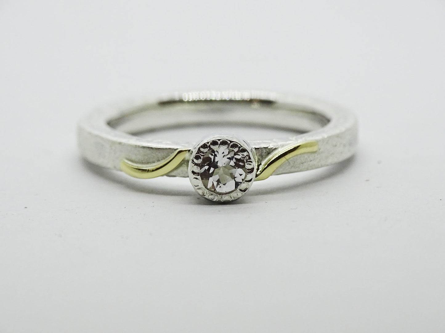 White Topaz 4mm ring