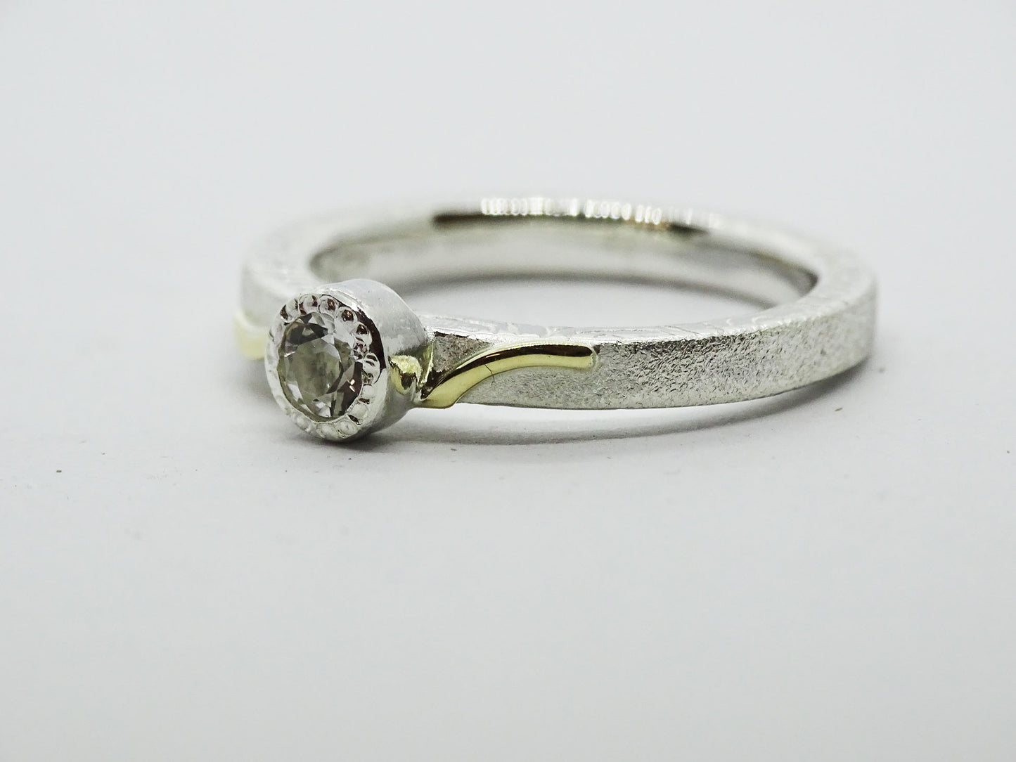 White Topaz 4mm ring