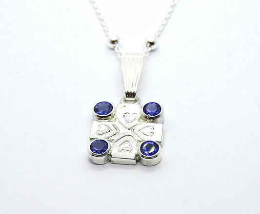 Tanzanite cross pendant.