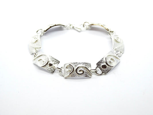 Silver link bracelet.