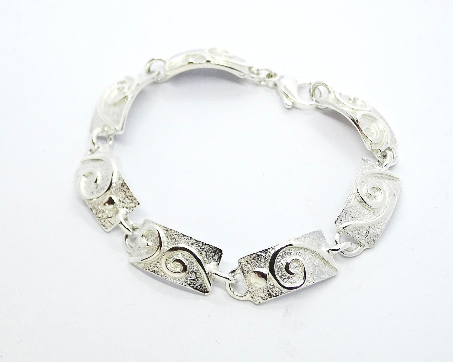 Silver link bracelet.