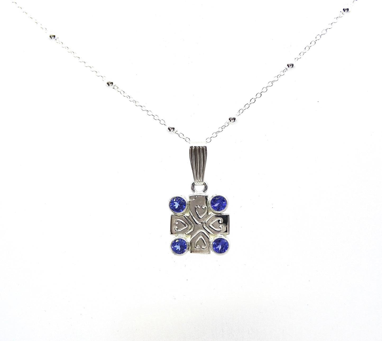 Tanzanite cross pendant.