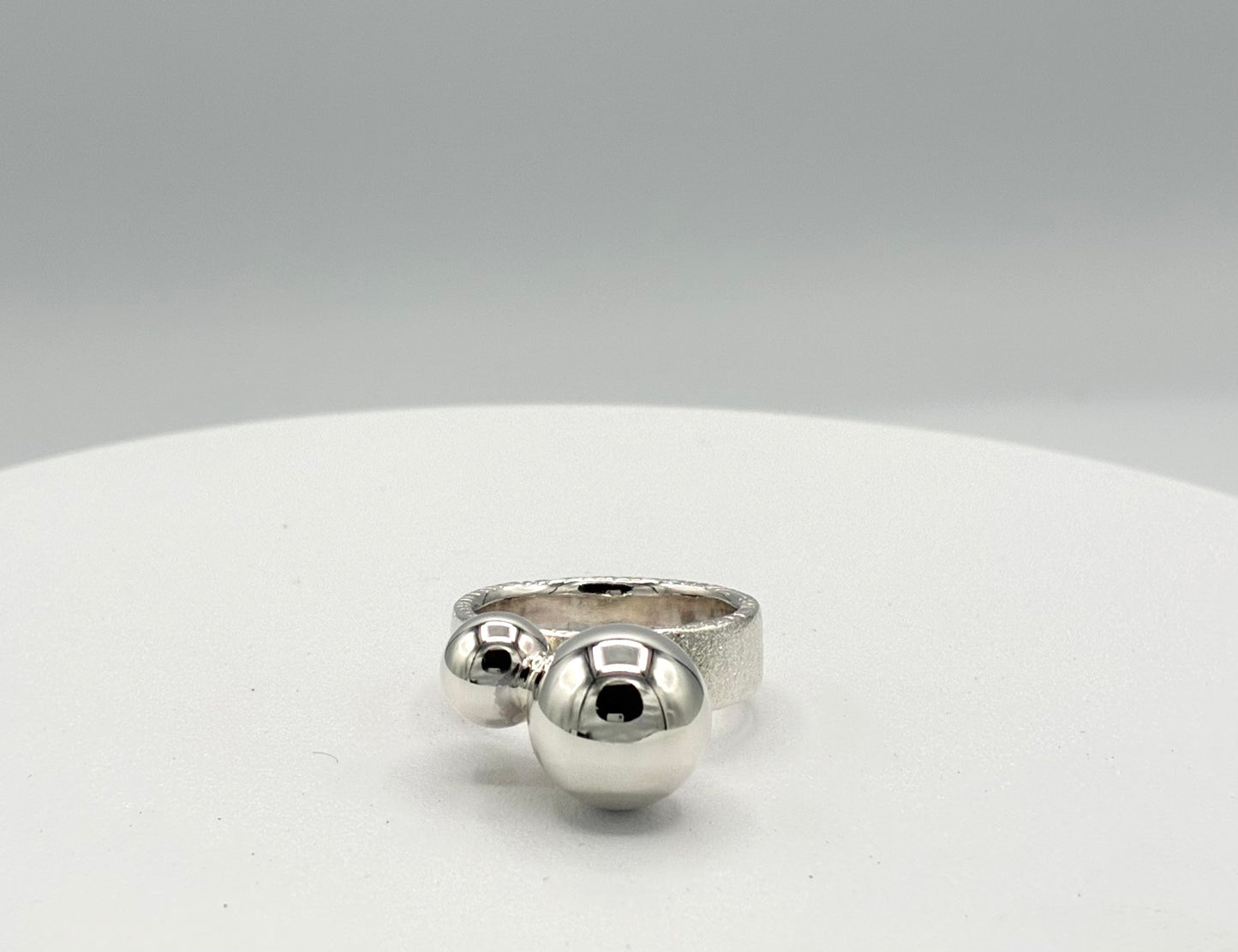 Ring. Two Balls.