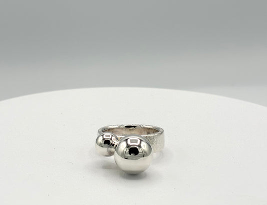Ring. Two Balls.
