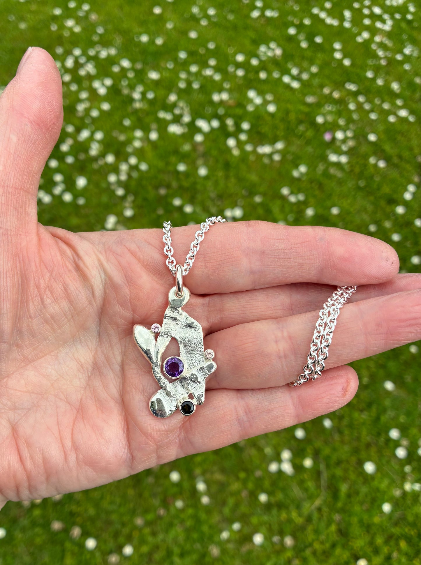 Pendant. Abstract four stone