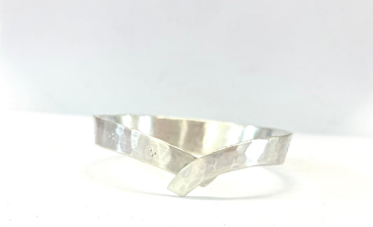 Bracelet. Cross over bangle.